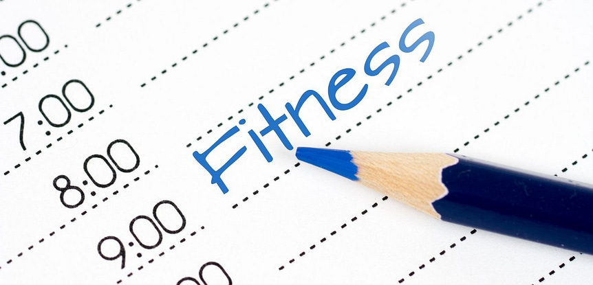 How long does it take to get fit. Day calendar with the word "Fitness" in blue pencil scheduled for 9:00.