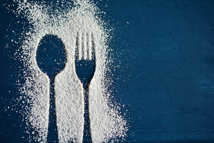 Do a sugar reset. Navy background, silhouette of spoon and fork outlined in powdered sugar.